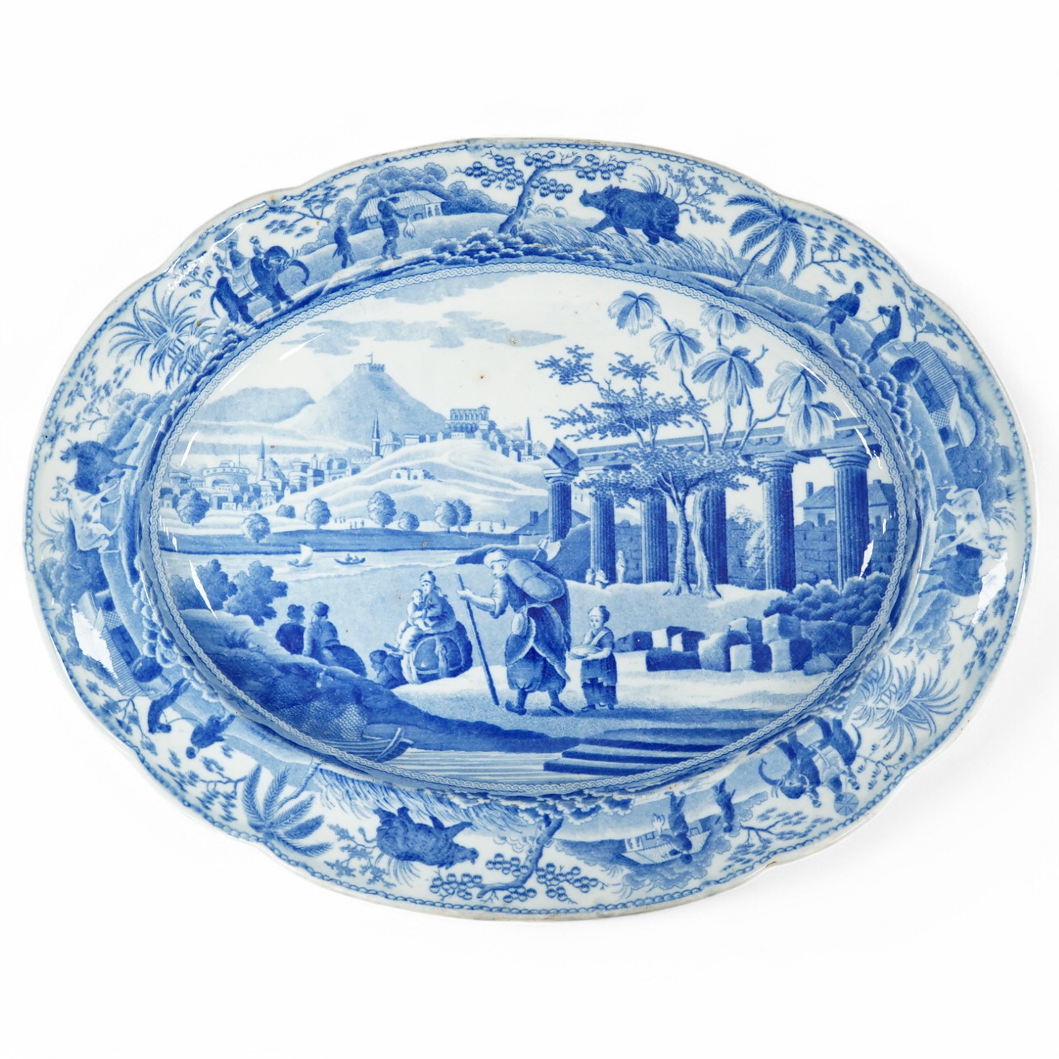 A 19th century Spode blue and white oval dish, with classical central scene and unusual elephant and rhino and boar border. 33cm wide. Condition - minor glazing faults.